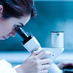 laboratory_research_microscope_female_technician_595x240