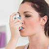 woman-taking-asthma-treatment-100x100
