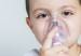 boy having asthma treatment