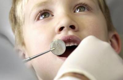 Boy having dental examination