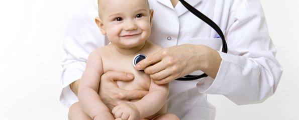 doctor examining baby