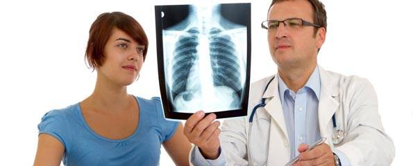 Doctor and patient looking an x-ray image