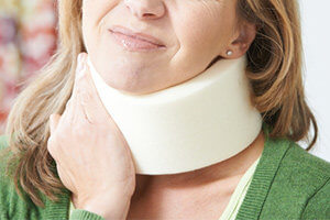 woman-neck-brace-whiplash-pain-accident-300x200